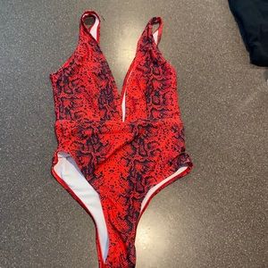 Red and black snakeskin one piece bathing suit